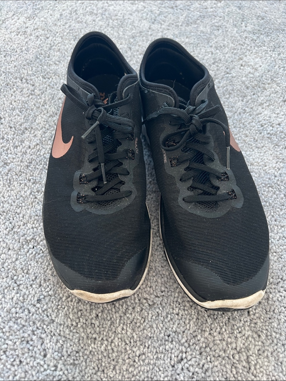 Nike Black Athletic Sneakers with Gold Rose Swoosh